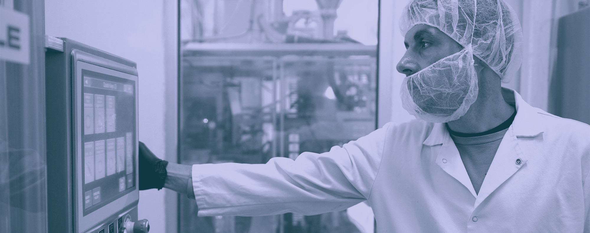 Worker with hairnet and face mask