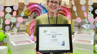 Carla Hill celebrated at ALULA for 20th anniversary.
