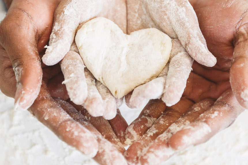 dough heart in hands